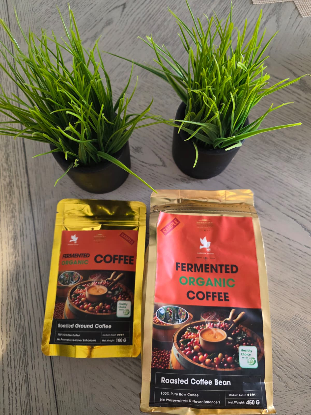 FERMCAFE coffee beans, grinder and packaging of fermented organic coffee from Vietnam.